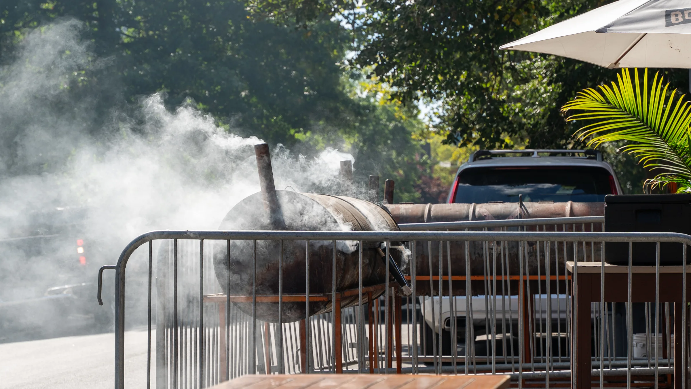 Smoker and outdoor dining patio photographed at Wadadli Jerk restaurant
